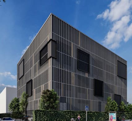 Rendering of the Prathumwan Smart District Cooling plant, a boxy building wrapped in vertical metal louvres